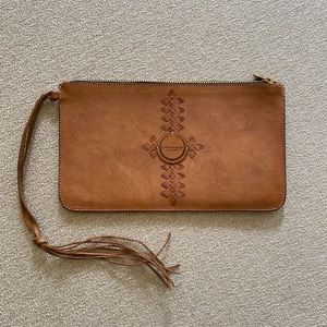 CARAVANA MONTECRISTO Genuine artisanal boho handmade leather clutch.